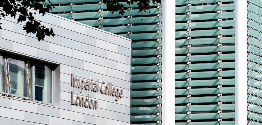 Closeup of modern buildings with a Imperial College London as building signage.