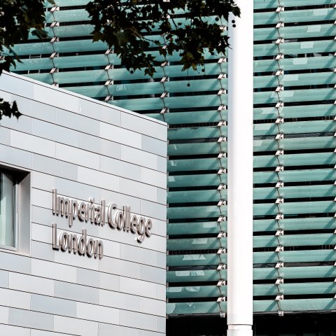 Closeup of modern buildings with a Imperial College London as building signage.