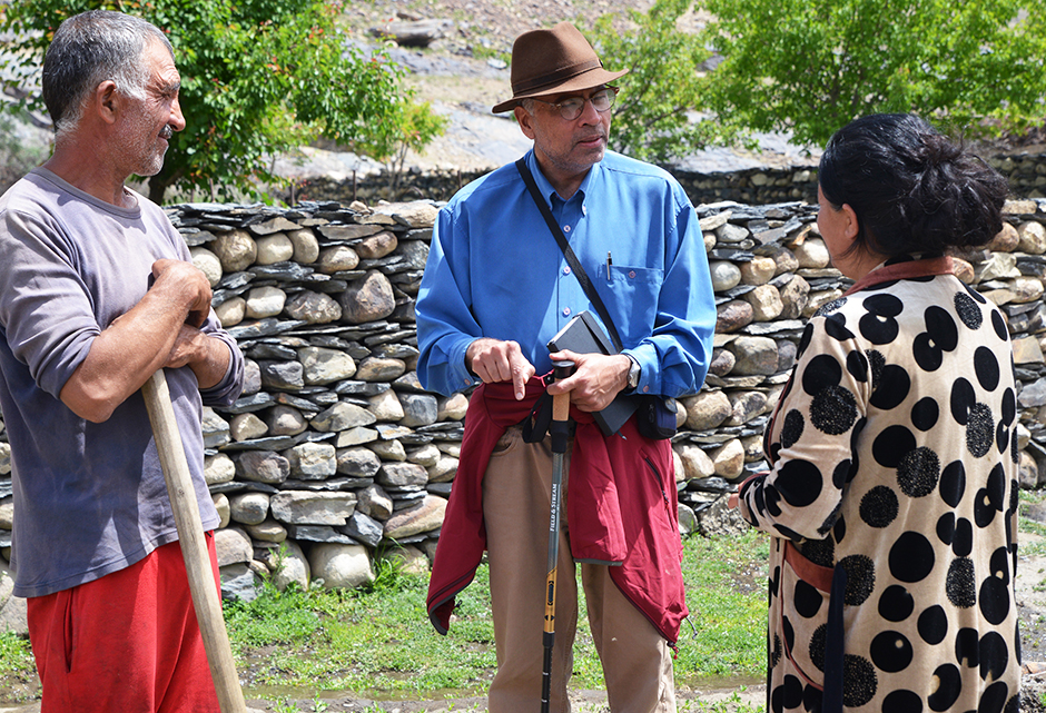 Karim Kassam and villagers in Savnob