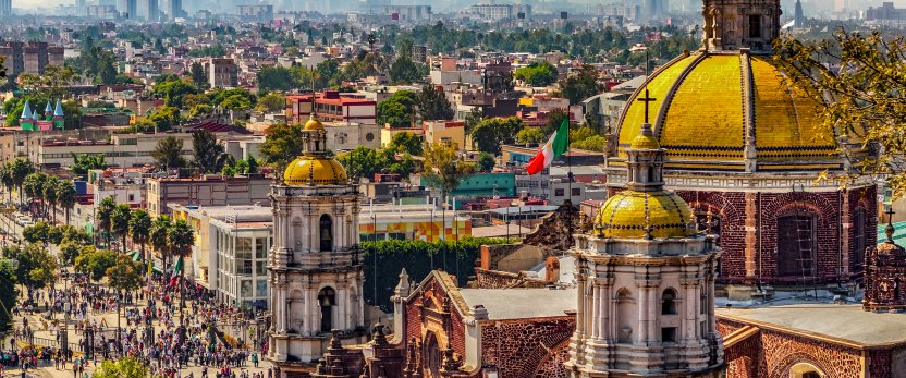 An old basilica and cityscape of Mexico City