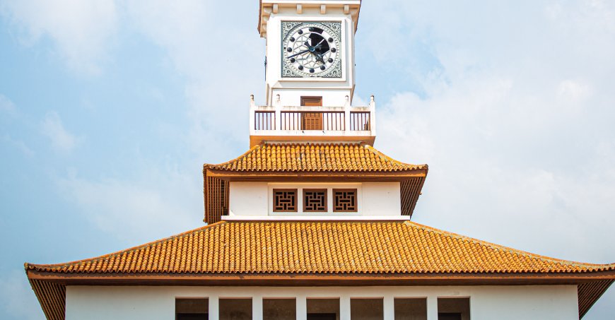 Clay roofline with a clock tower.