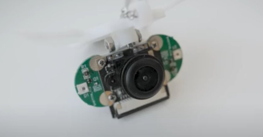 Close-up of a necklace that is also a mini computer.