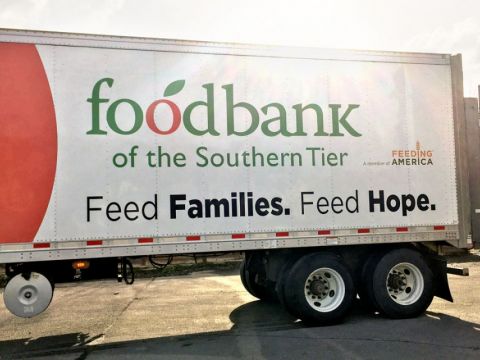 Large white truck with Food Bank of Southern Tier written on the side of the truck. Provided