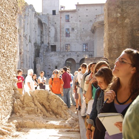 Students touring ruins in Italy.